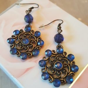 1 Pair Left, Blue Crystal Errings, Pierced.